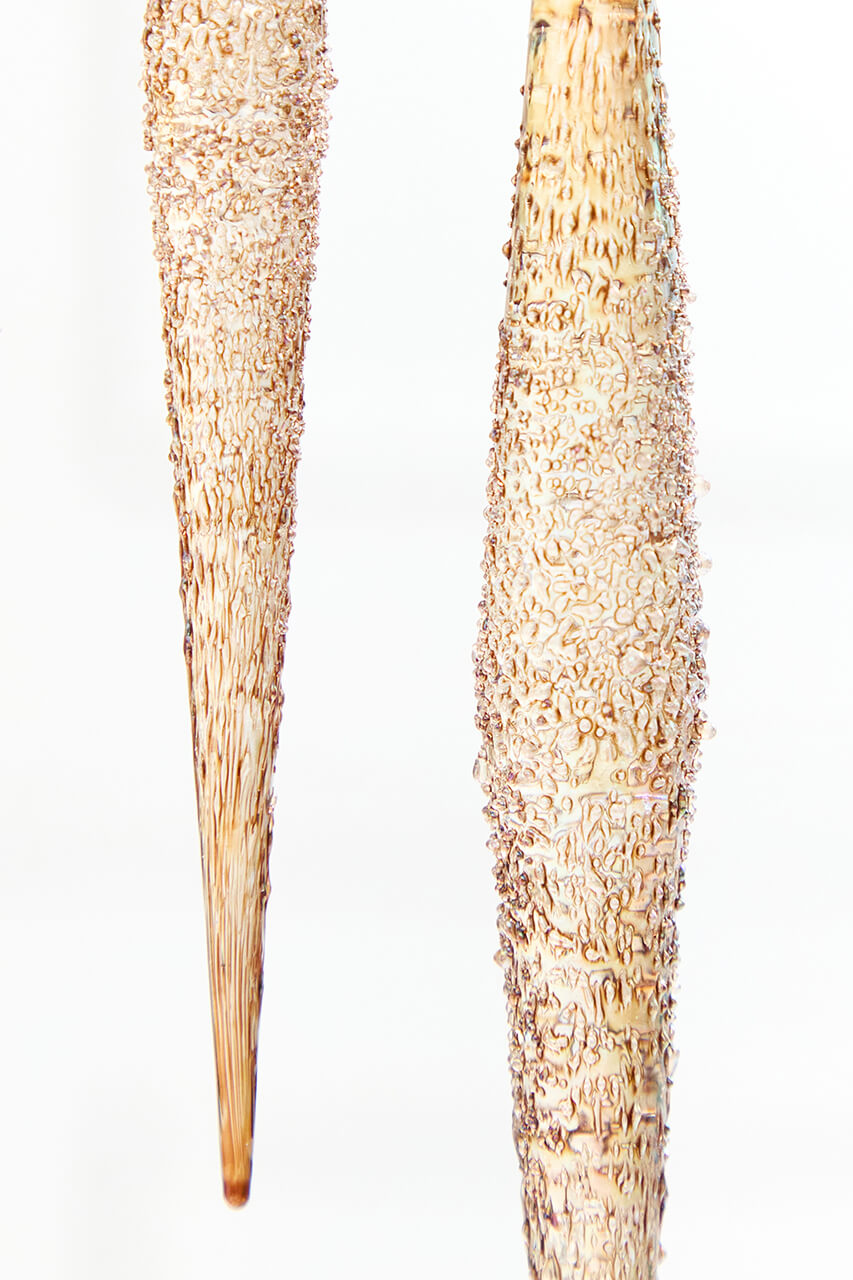 9.75” Glass Champagne Icicle Ornament
