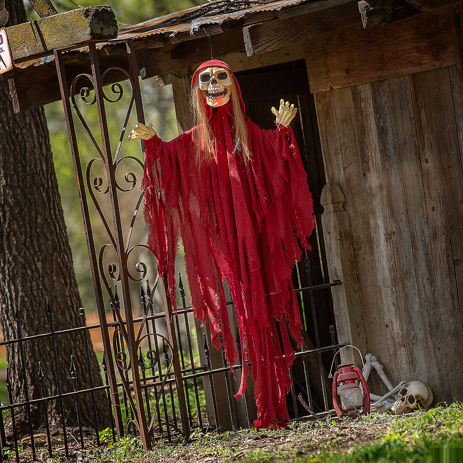 Light-Up Skeletal Reaper in Red Robes Halloween Hanging Decoration 66 3/4"