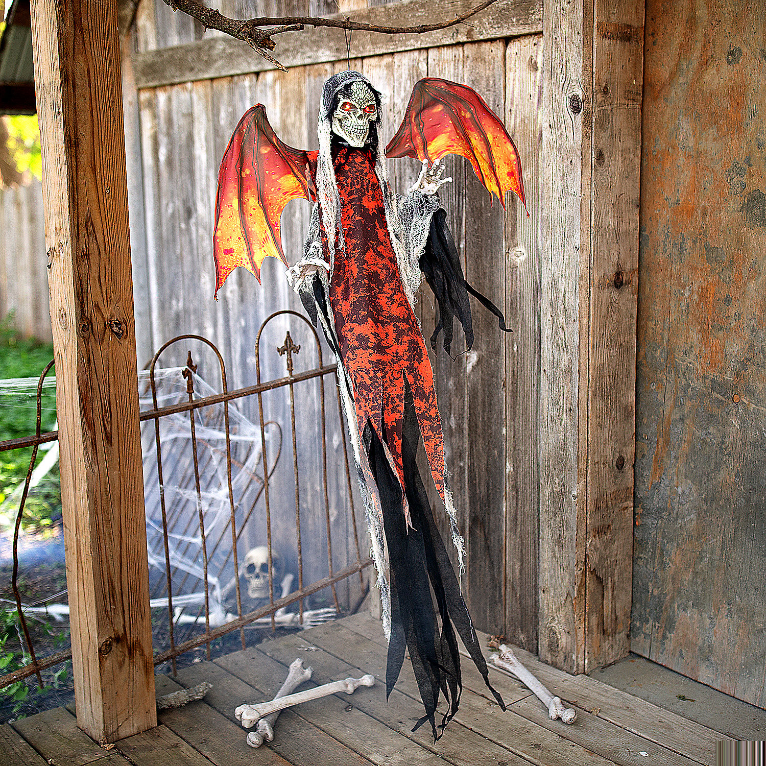 Animated & Light-Up Red Skeletal Reaper with Wings Hanging Decoration 60 1/4"
