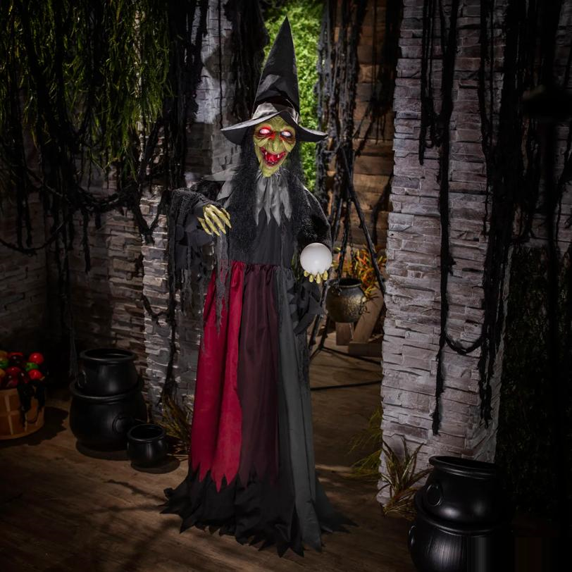 6 Ft. 2" Animated Light-Up Standing Talking Witch with Green Face Halloween Decoration