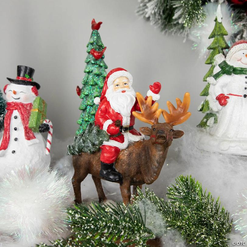 Santa Claus on a Reindeer Holding a Frosted Pine Tree Christmas Figurine - 8.25
