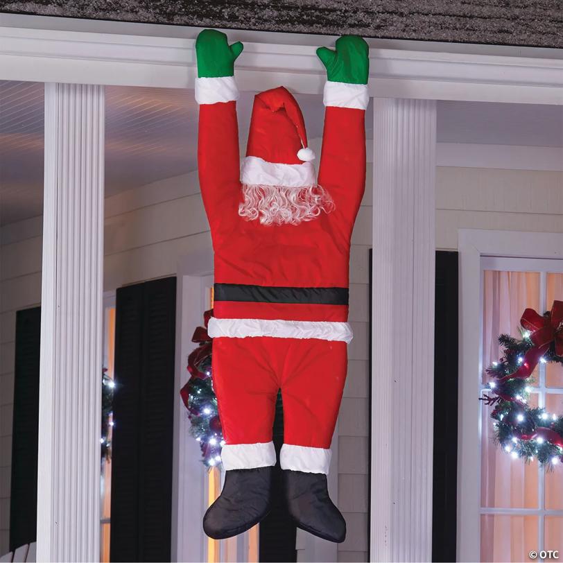 Santa Hanging from Gutter