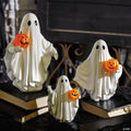 White Ghosts Holding Light-Up Jack-O'-Lanterns Resin Tabletop Decoration - 3 Pc.