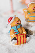 4” Resin Sledding Gingerbread Man Ornament
